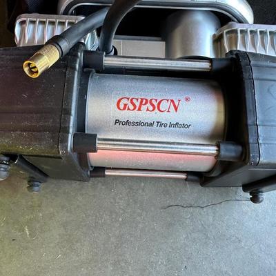 GSPSCN PROFESSIONAL TIRE INFLATOR, LUG NUTS, OIL AND FUEL FILTER, GLOVES, MUFFLER CLAMP AND OTHER ITEMS