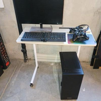ANTEC TOWER, SMALL TABLE, KEYBOARD, XBOX CONTROL, MONITOR