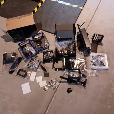 A PILE OF MISC COMPUTER PARTS