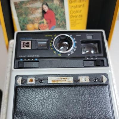 Kodak EK6 and Minolta 450E Cameras