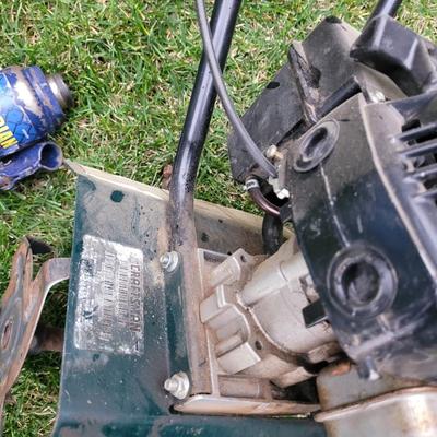 Front tine roto tiller and bottle jack