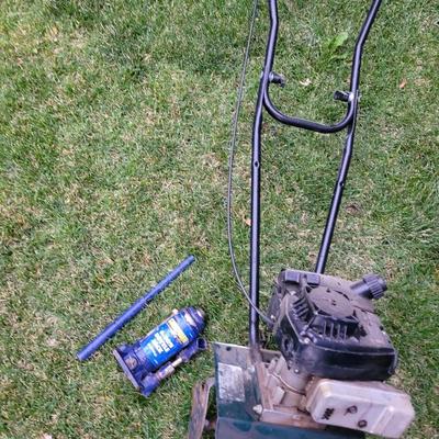 Front tine roto tiller and bottle jack