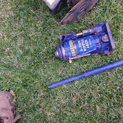Front tine roto tiller and bottle jack