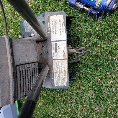 Front tine roto tiller and bottle jack