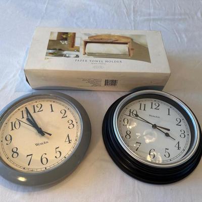 Paper towel holder and two clocks