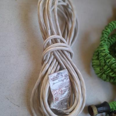 Extension cord and pocket hose with nice brass shut-off fitting
