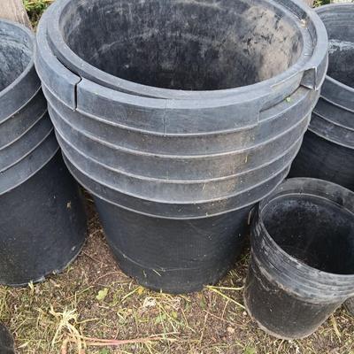 Assortment of gardening plant pots - large and small