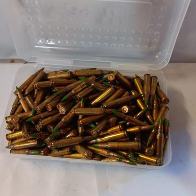 Plastic pencil case full of 5.56 green tip ammunition