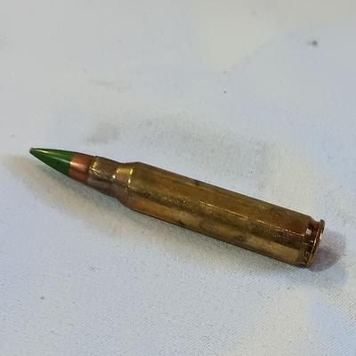 Plastic pencil case full of 5.56 green tip ammunition