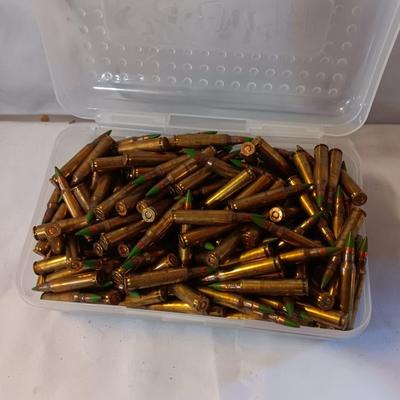 Plastic pencil case full of 5.56 green tip ammunition