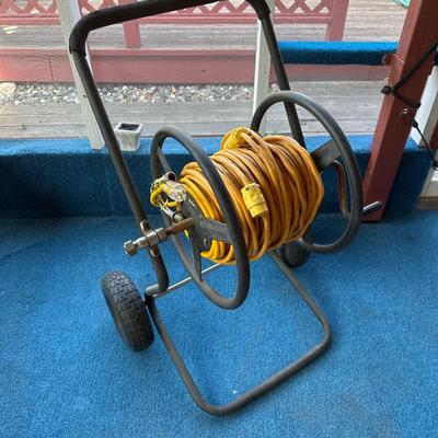 Extension cord on wheeled trolley