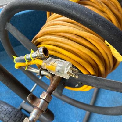 Extension cord on wheeled trolley