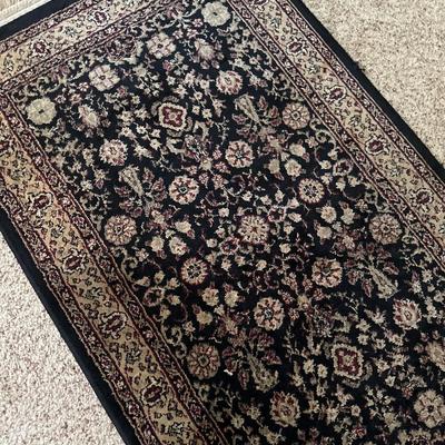 Entryway, rug, and bench