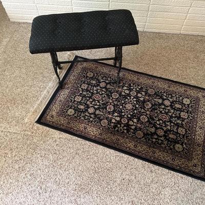 Entryway, rug, and bench