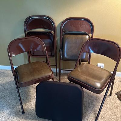 4 folding chairs and comfort curve cushion
