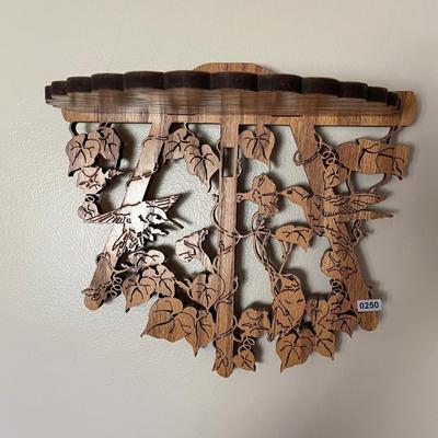 Wooden hummingbird shelf