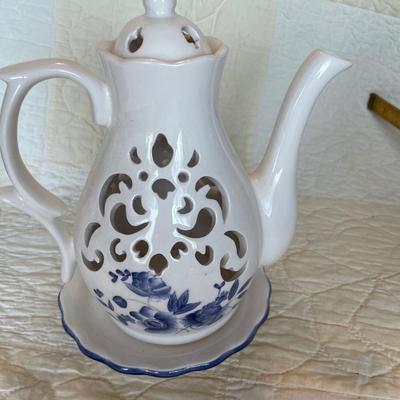 Filigree teapot candle holder