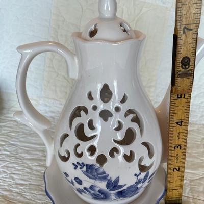 Filigree teapot candle holder