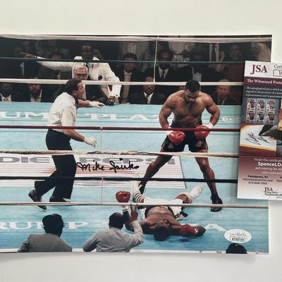 Michael Spinks signed photo. JSA