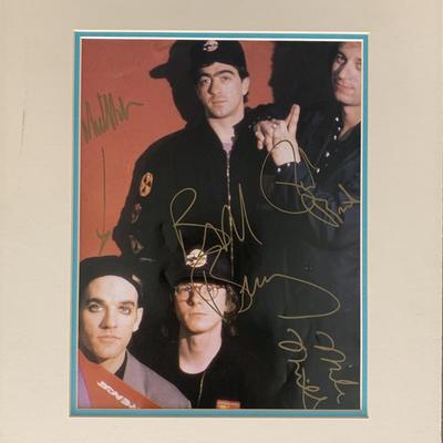 R.E.M. signed photo