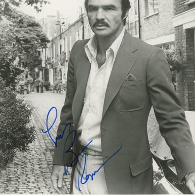Rough Cut Burt Reynolds signed movie photo. GFA Authenticated
