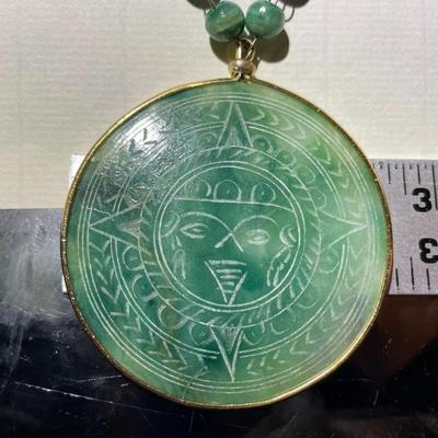 Vintage Etched Mexican Green Onyx Stone Necklace 26" Long w/Aztec Sun God Pendant in Good Preowned Condition.
