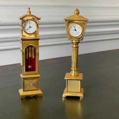 2 Miniature Gold-Tone Clocks