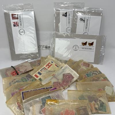 First Day of Issue Stamps & Box of International Stamps