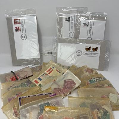 First Day of Issue Stamps & Box of International Stamps