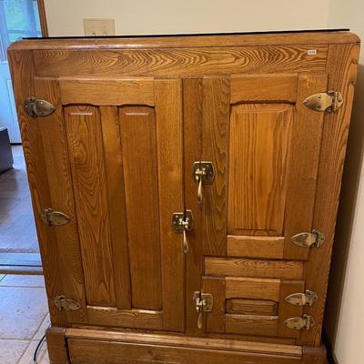 Antique ice box-glass piece on top for protection