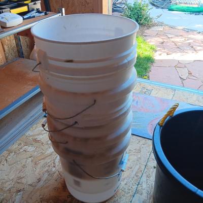 SIX 5 GALLON BUCKETS AND A TUB WITH ROPE HANDLES