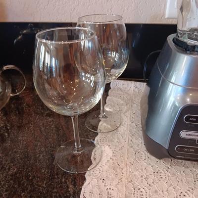 OSTER BLENDER, 6 TUMBLERS AND 2 STEMMED GLASSES