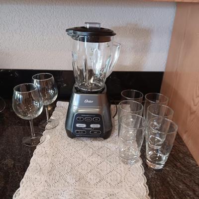 OSTER BLENDER, 6 TUMBLERS AND 2 STEMMED GLASSES