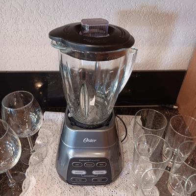 OSTER BLENDER, 6 TUMBLERS AND 2 STEMMED GLASSES