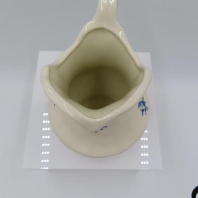 Off white pitcher
