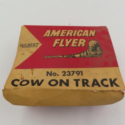 American Flyer Cow on Track