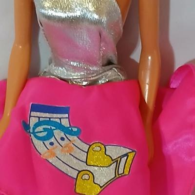 Four 1960's barbie dolls with clothes