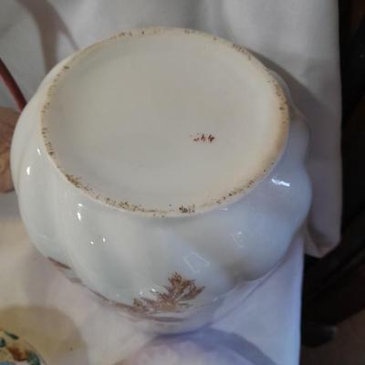 Delicate collectibles - lidded porcelain canister - vase - doll - and more