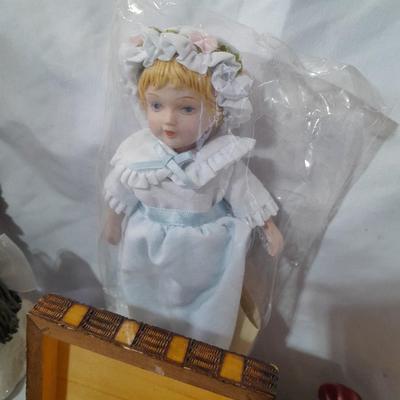 Delicate collectibles - lidded porcelain canister - vase - doll - and more