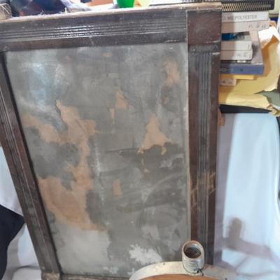 Antique picture frame with wagon wheel lamp