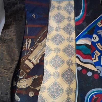 Ten neck ties and a hanger for them