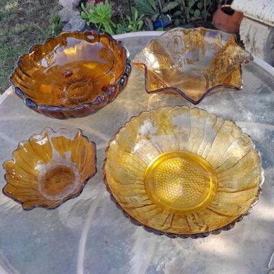 Amber glass bowls - Pedestal bowl and flower shape pressed glass