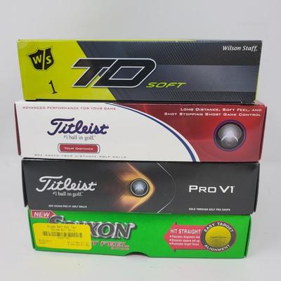 Four Boxes New Golf Balls - Titleist & TPro, Srixon, TD