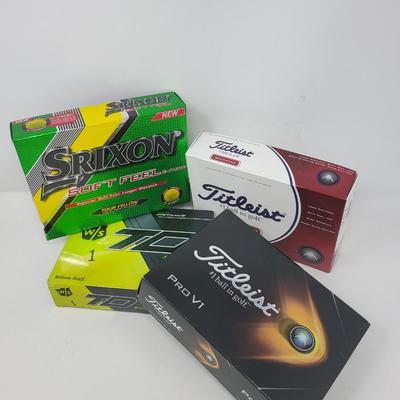 Four Boxes New Golf Balls - Titleist & TPro, Srixon, TD