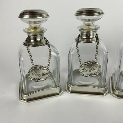 677 Set of Four Glass/Pewter Decanters w/ tags