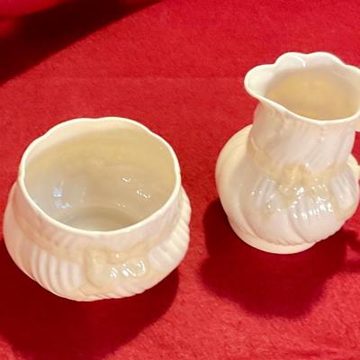 Belleek China from Ireland, cream colored with a yellow bow