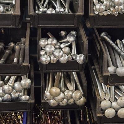 Large Wall Mounted Hardware Holder filled with Bolts, Nails, Screws & Other Hardware