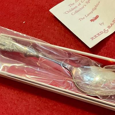 Collectors Christmas spoon, the lamp lighter by Reed And Barton
