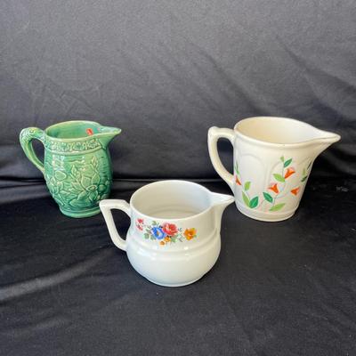 Lot 112 Vintage utilitarian Pitchers