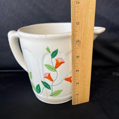 Lot 112 Vintage utilitarian Pitchers